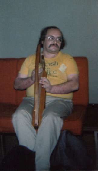 Alexei Kondratiev playing harp at MythCon