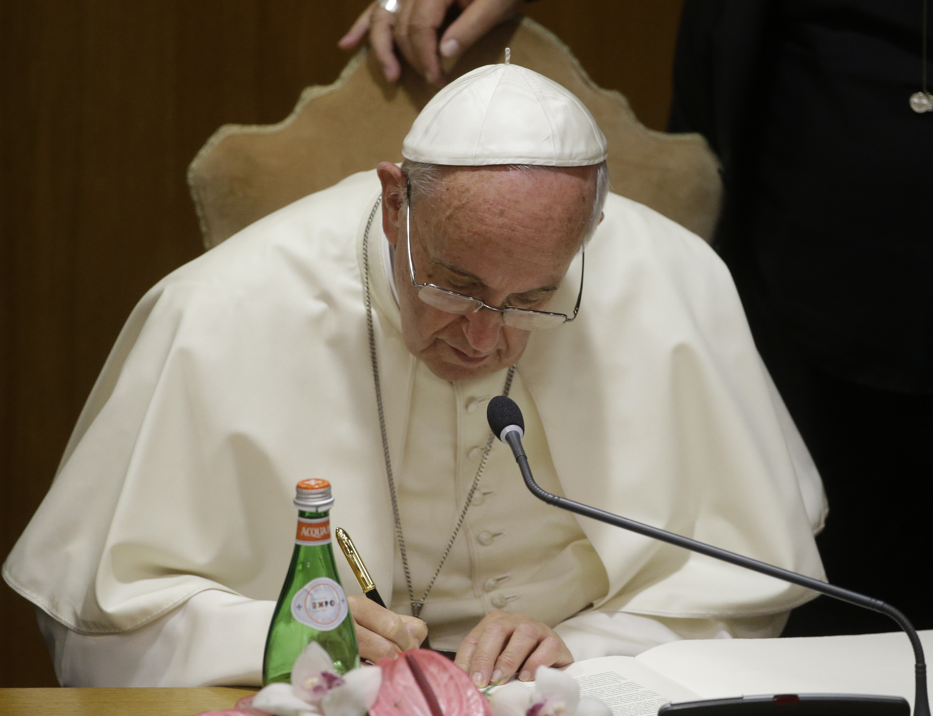 Pope Francis Signing